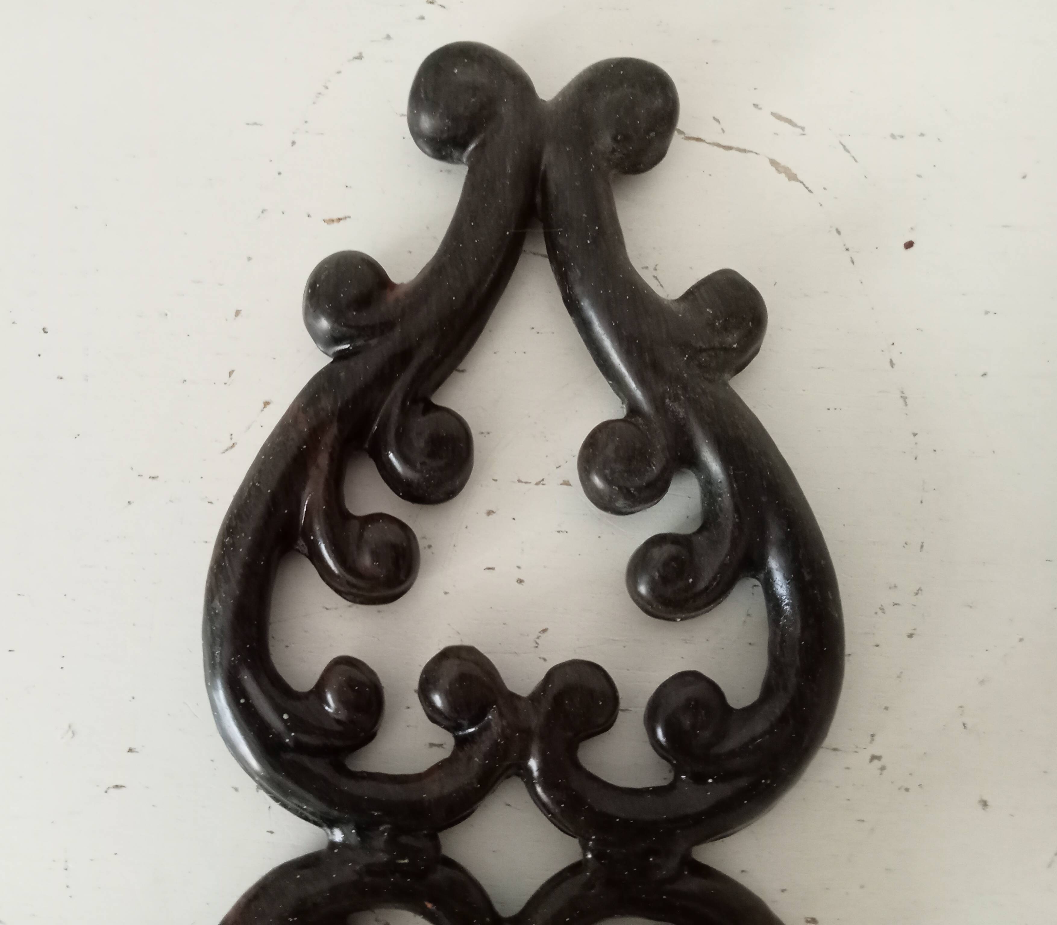 Antique wall candle holder in enamelled cast iron