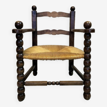 Fauteuil en chêne et paille.