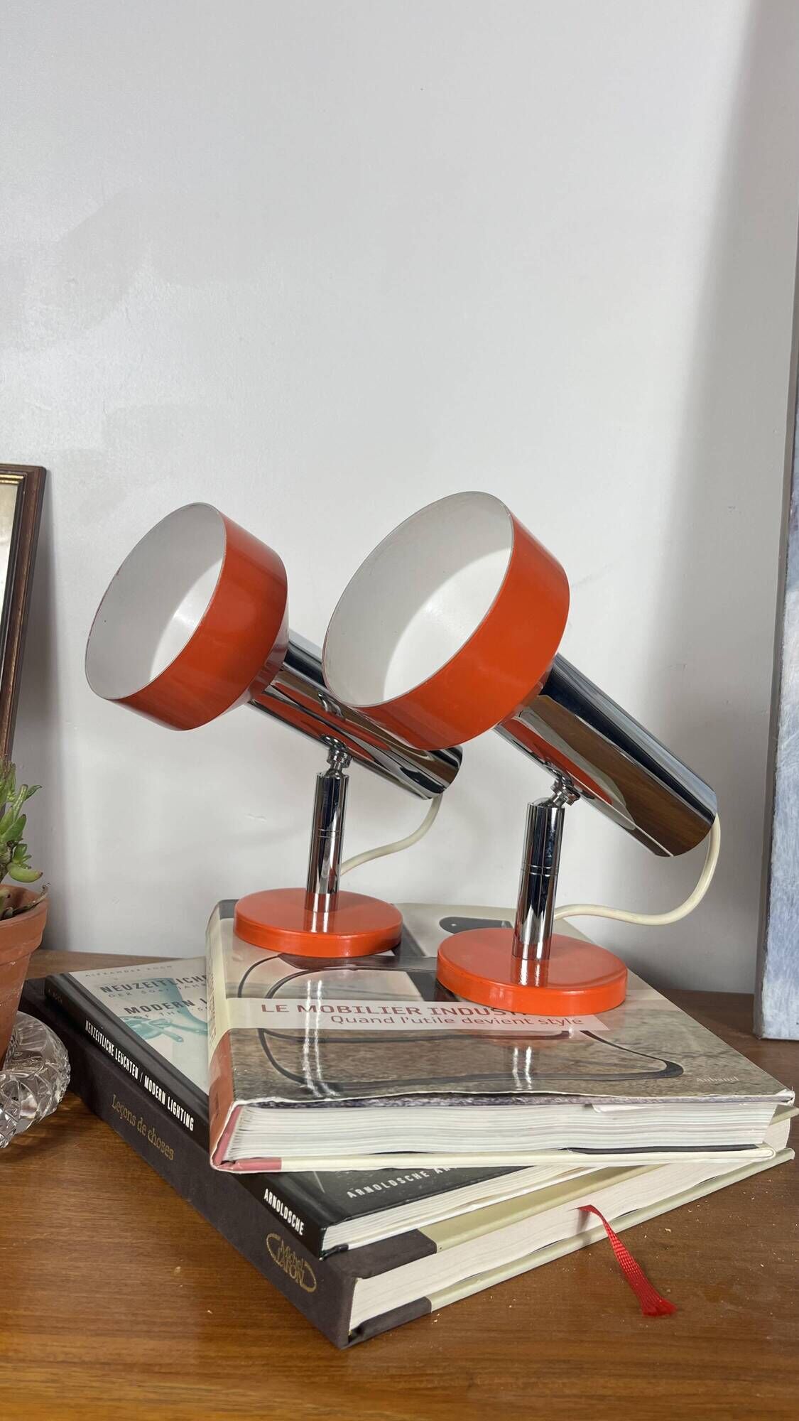 Pair of orange aluminium wall spotlights from the seventies.