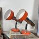 Pair of orange aluminium wall spotlights from the seventies.