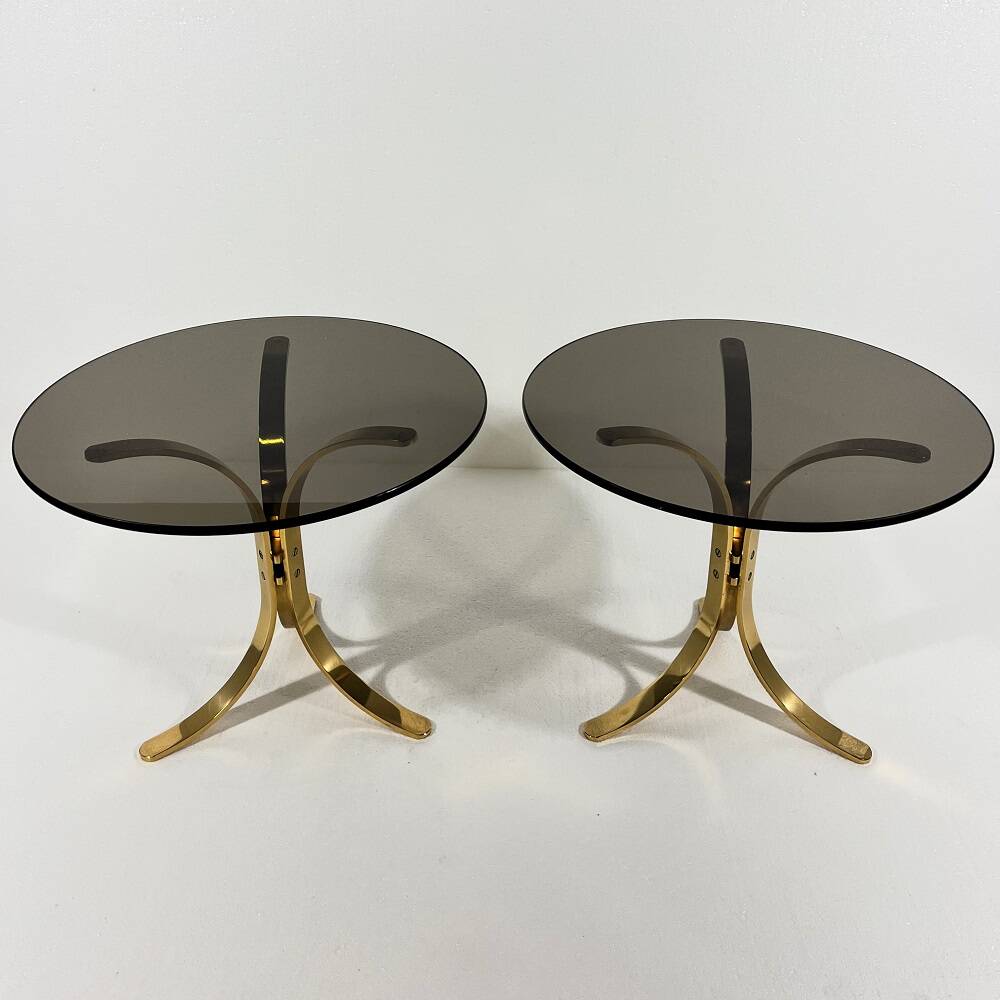 Brass and smoked glass side tables from the 1960s.