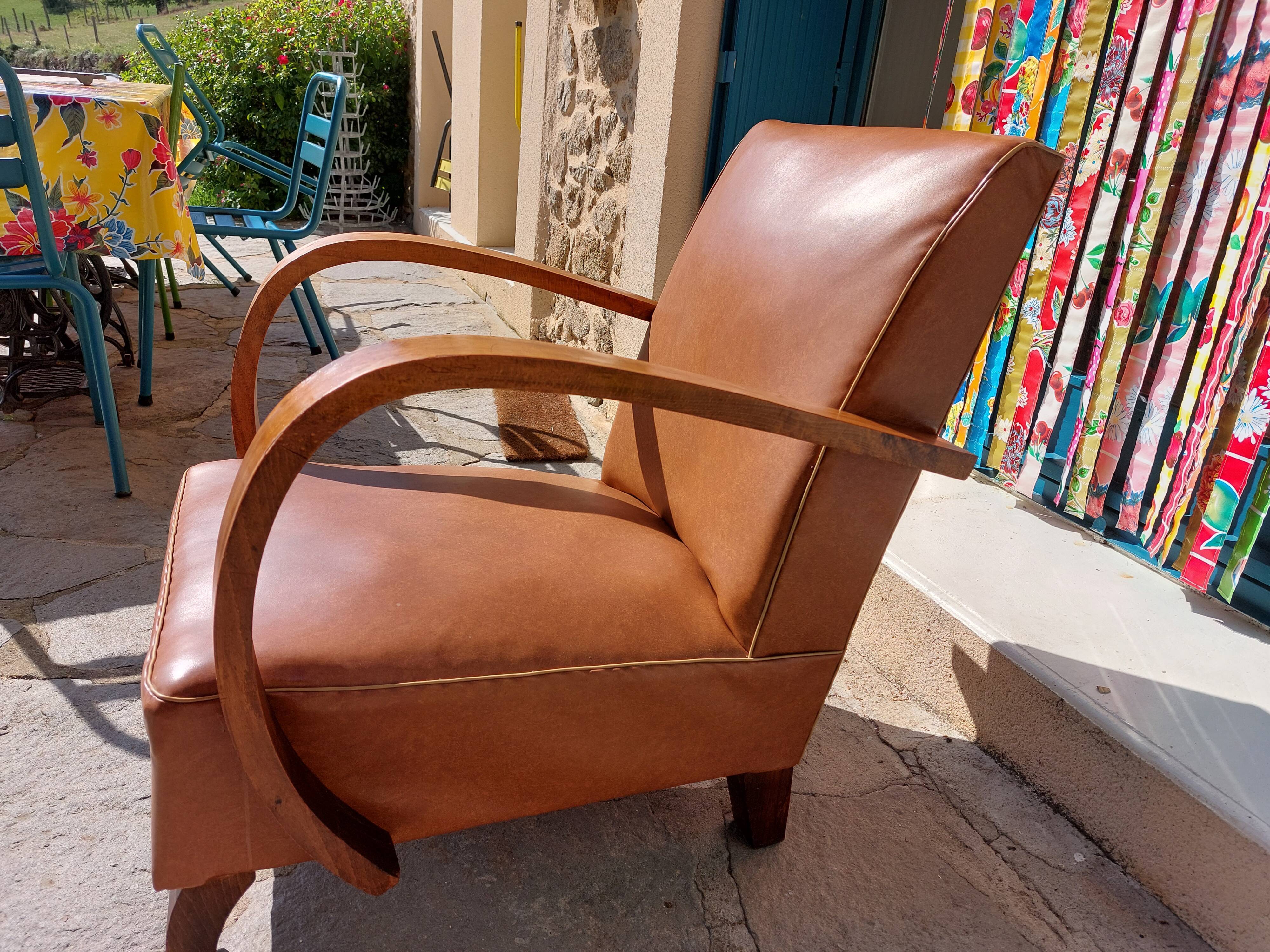 Low armchair, brown imitation leather