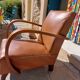 Low armchair, brown imitation leather