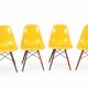 Set of 4 DSW chairs by Charles Eames - yellow fibreglass edition by Herman.