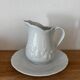 5 tasses 4 soucoupes et un crémier en porcelaine Philippe Deshoulières