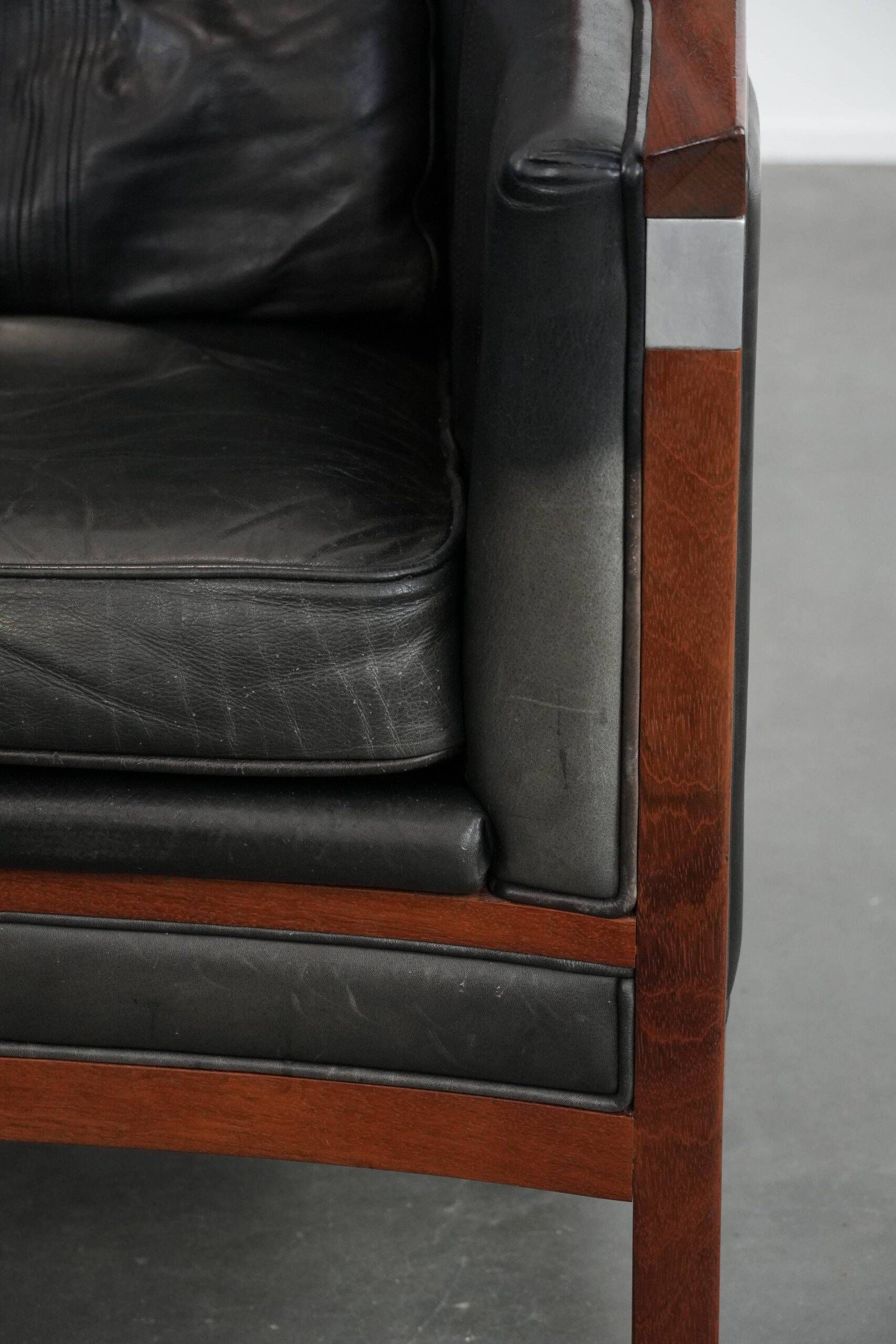 Black cow leather armchair in Art Deco design