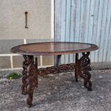 Asian table, mid-height, made of exotic wood.