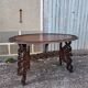 Asian table, mid-height, made of exotic wood.