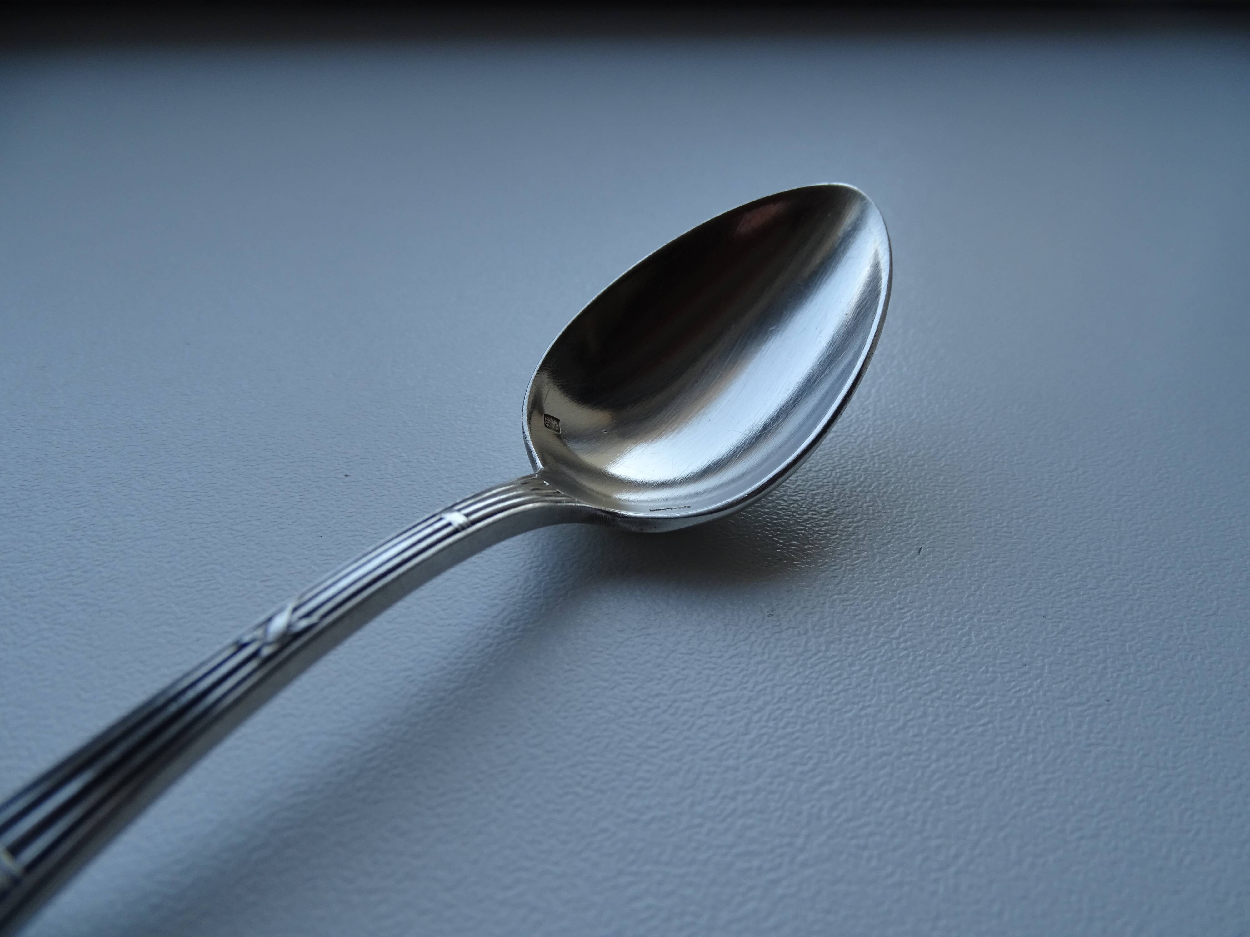 12 dessert spoons Apollo silver metal 1920 in case