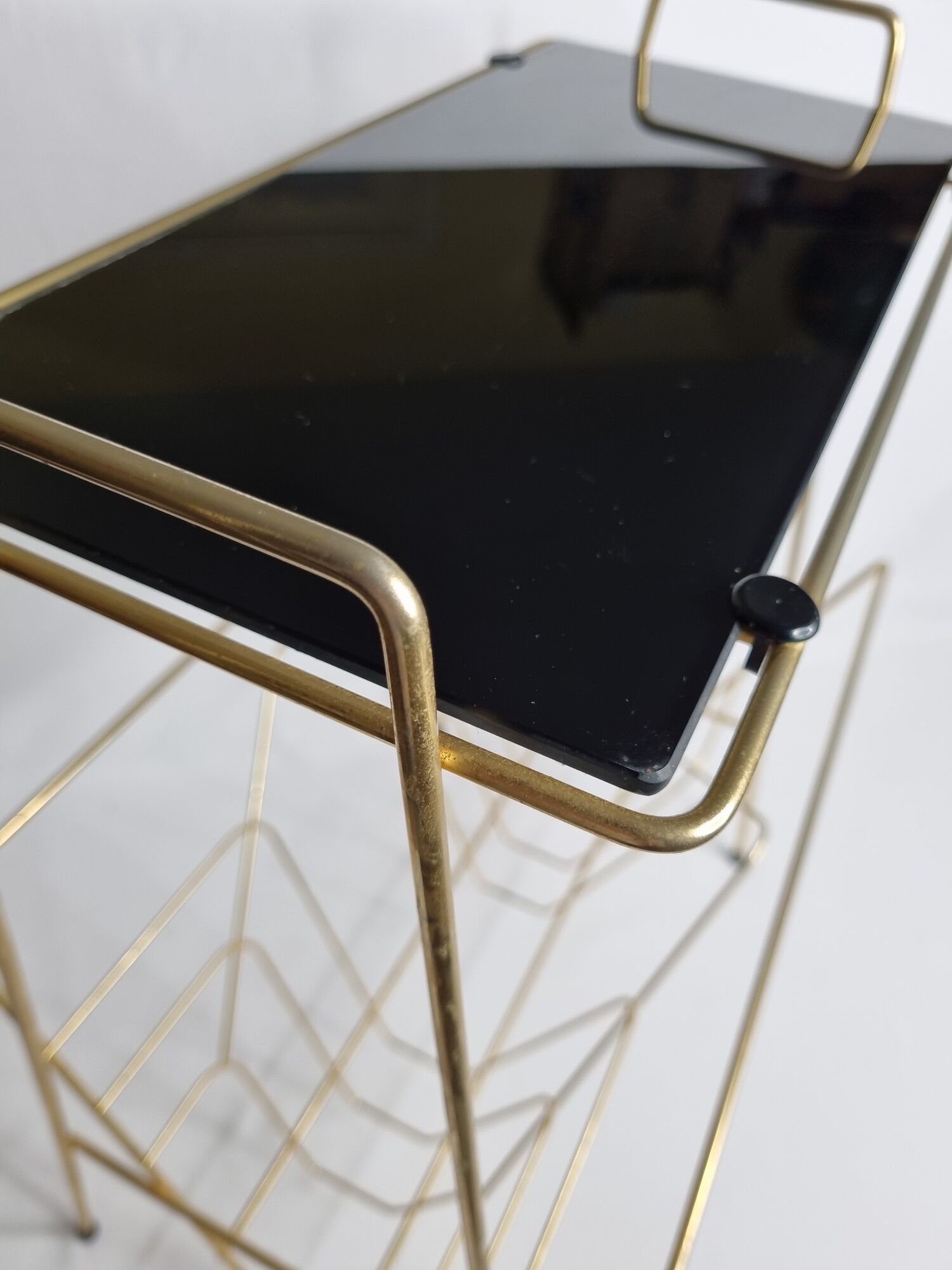 Vintage magazine shelf in glass and gilded metal