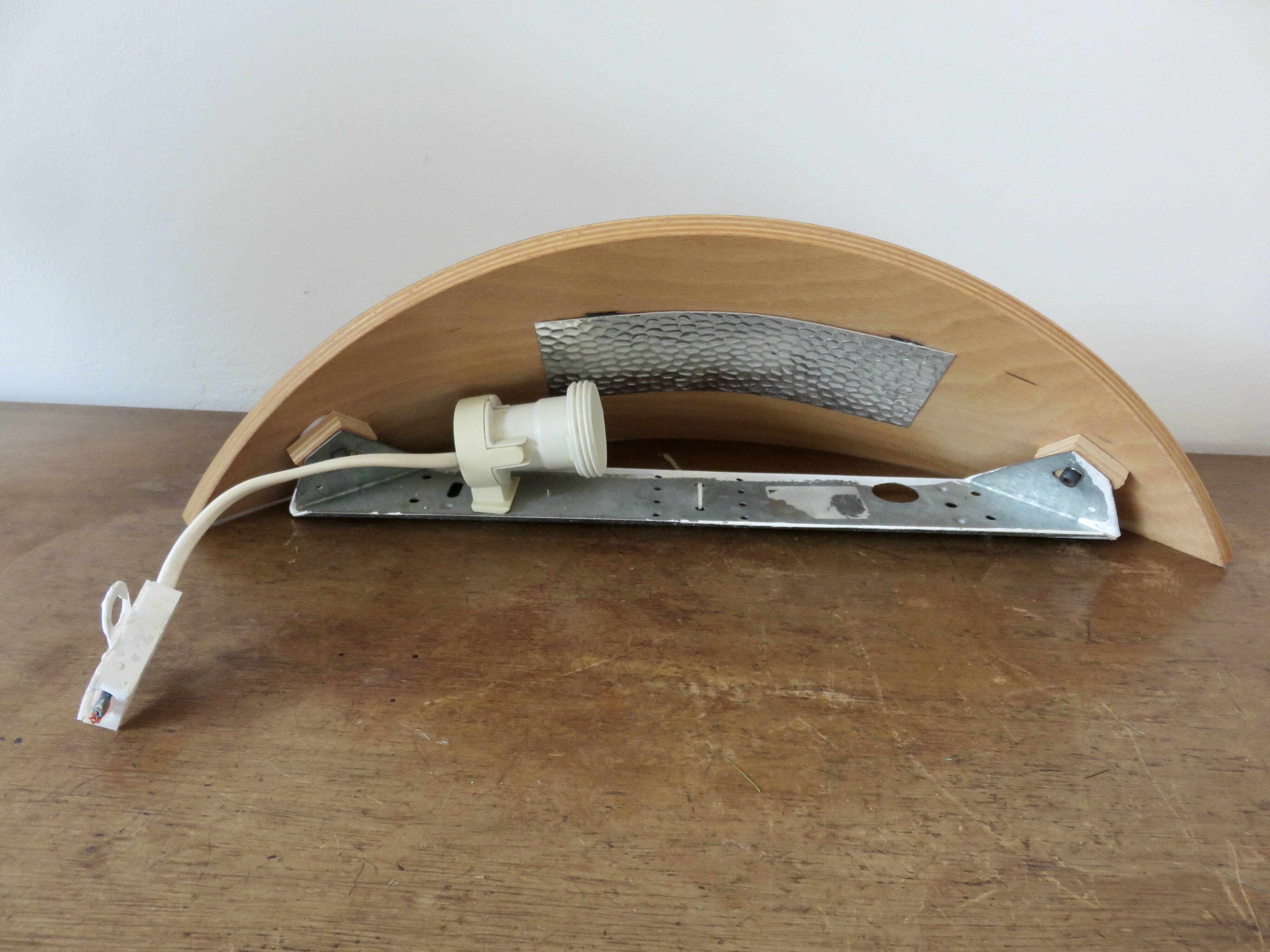 Pair of Scandinavian wall lights in bent wood with brass accents, 1980.