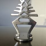 Ethnic “skeleton” candle holder in nickel-plated brass from the 80s