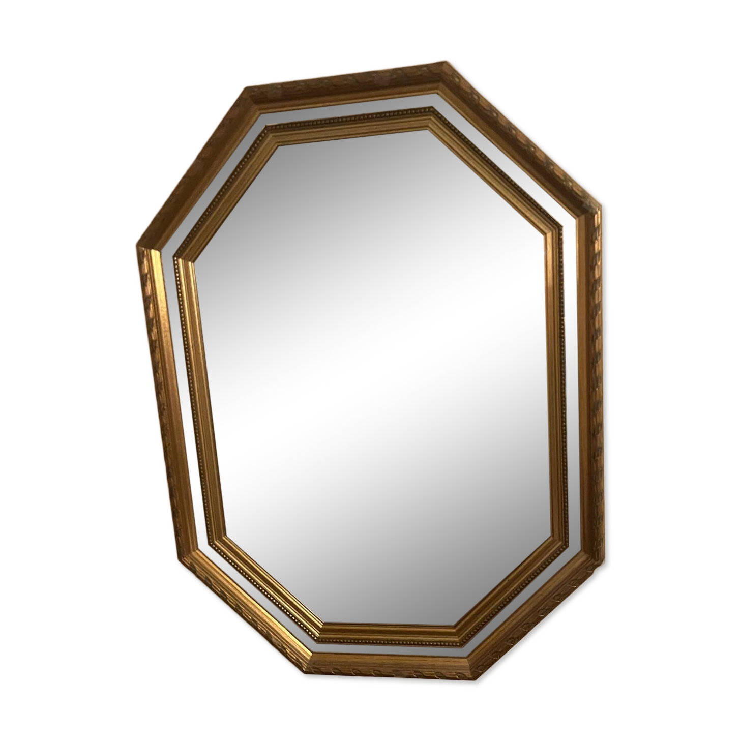 Octagonal mirror with gilded wooden beaded borders