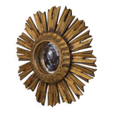 Miroir soleil en bois doré 1950