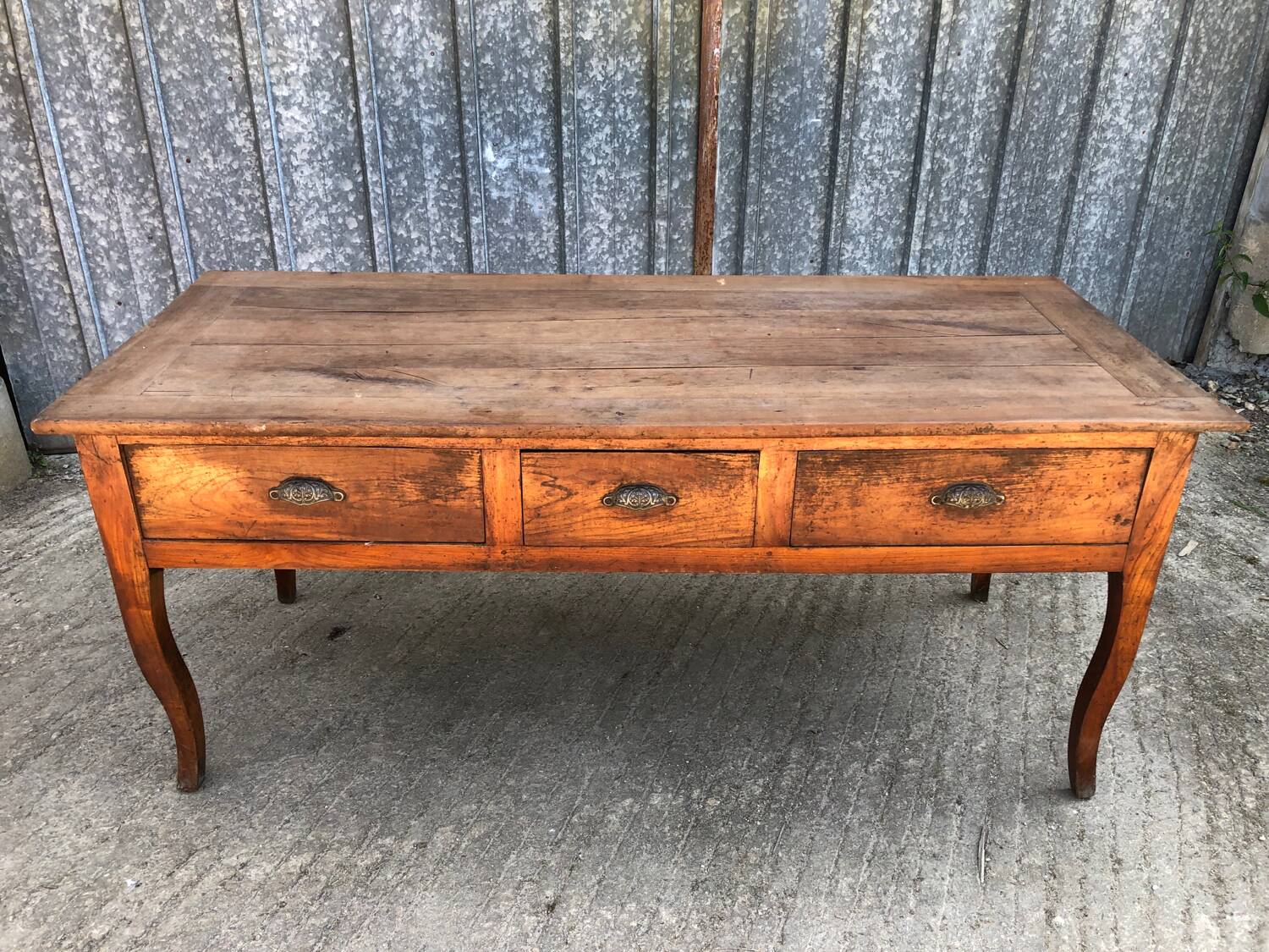 Antique solid cherry farmhouse table with 3 drawers and 2 pulls