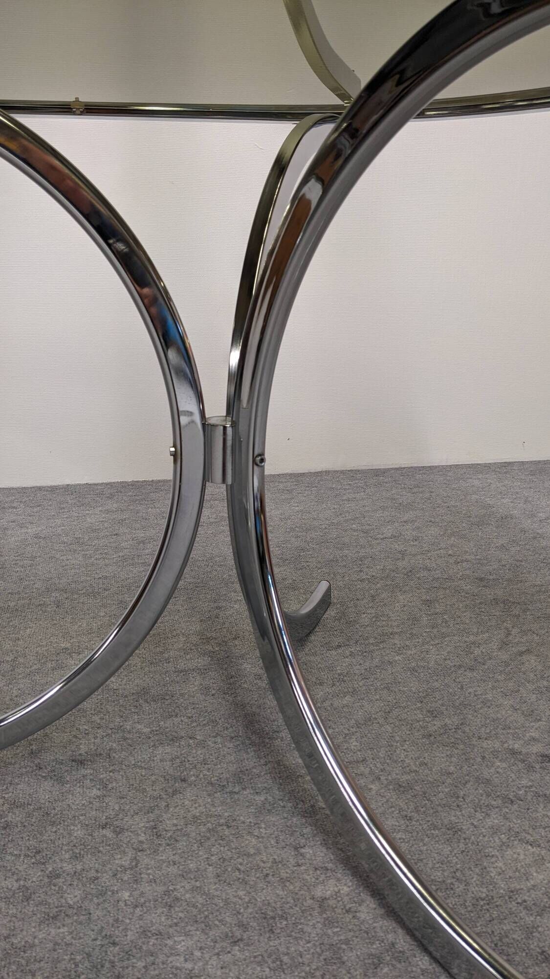 Oval dining table in chromed metal and smoked glass, Italy circa 1970