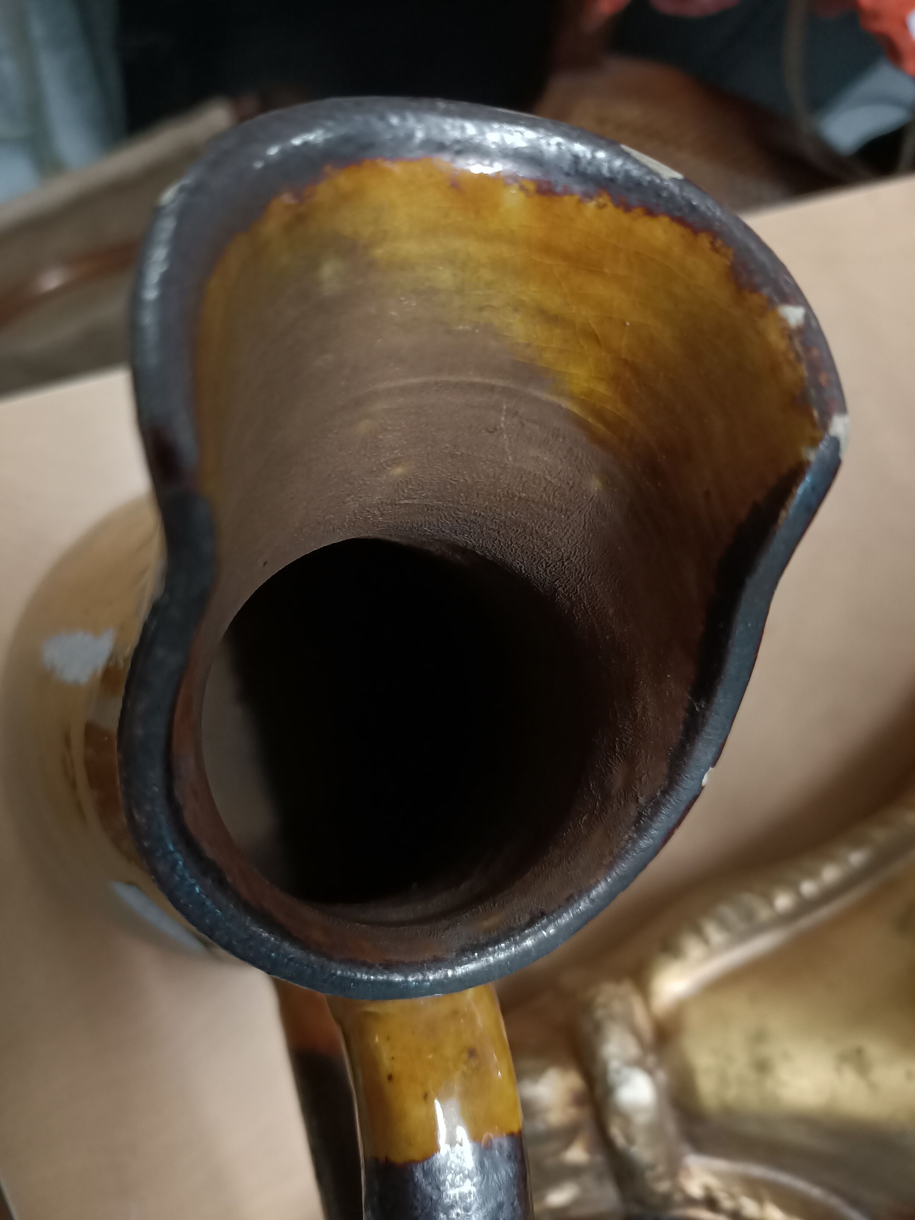 Enamelled terracotta jug