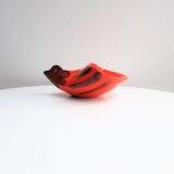 Empty orange enamelled pocket bird years 70