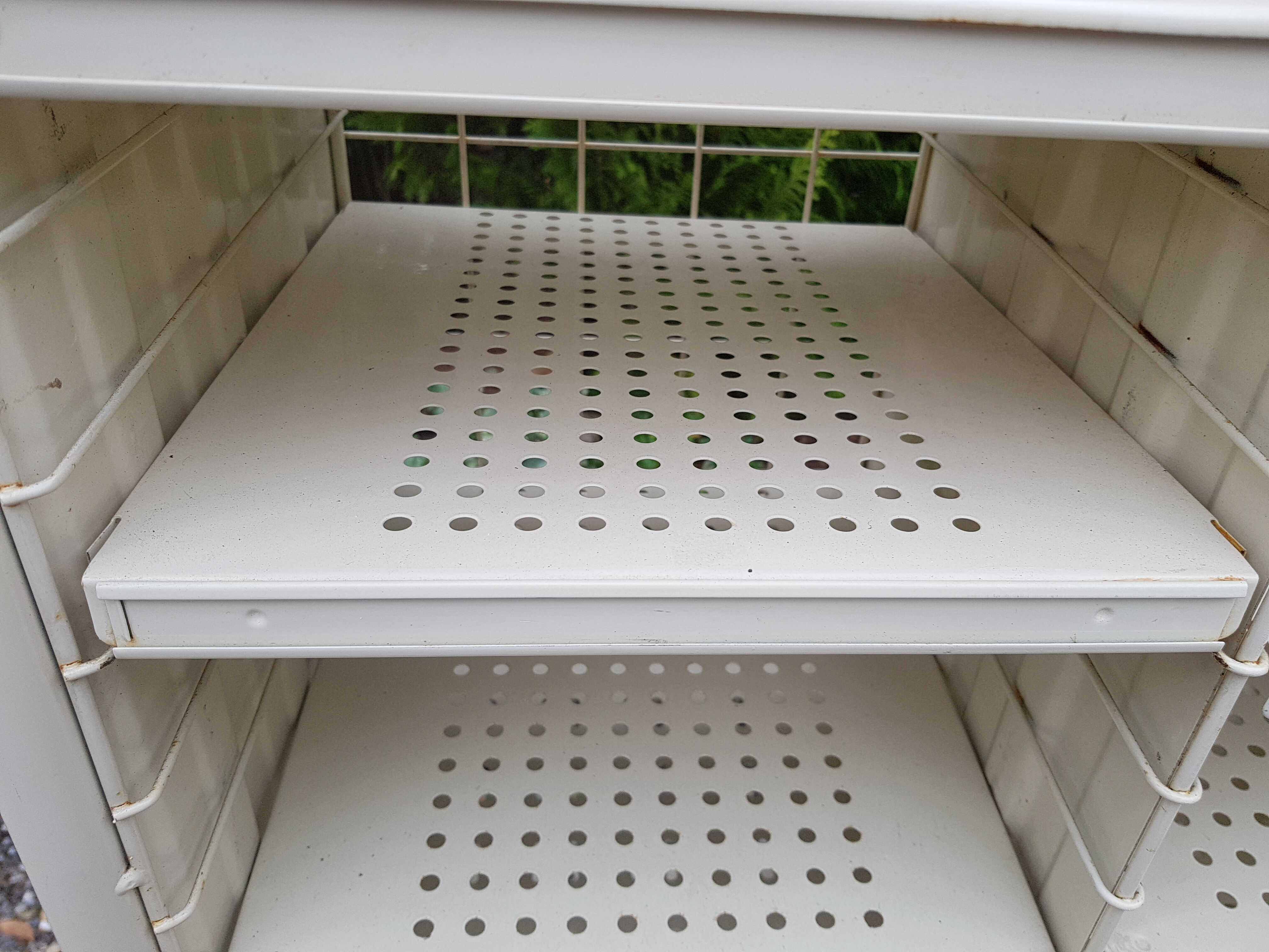 Metal shelf the Post