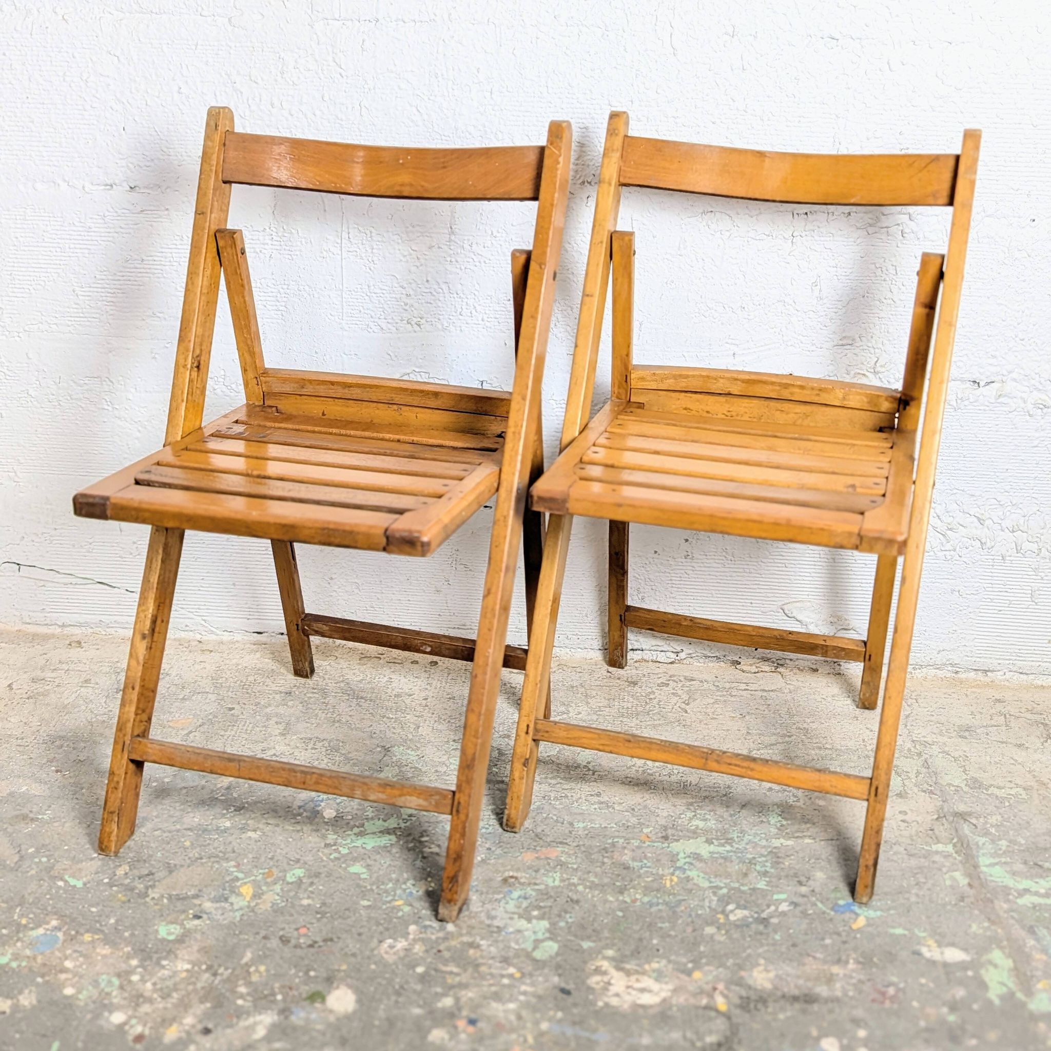 Pair of wooden folding chairs