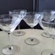 5 Vintage glass champagne coupes with engraved decoration