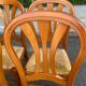 4 country-style Louis Philippe medallion chairs with rush seats from the 1970s.