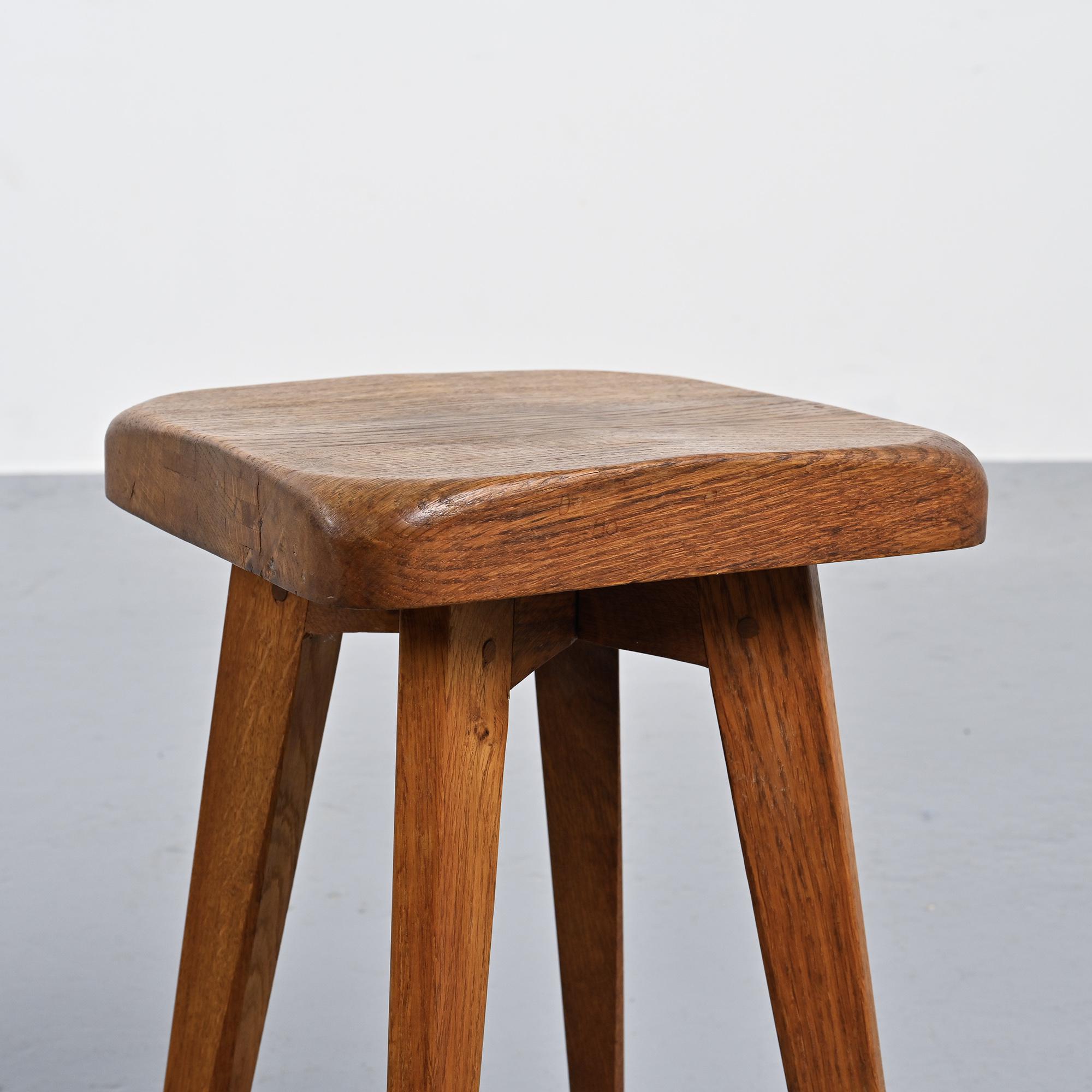 Solid oak stool, French craftsmanship, 1950s.