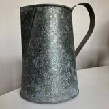 Old garden pitcher vase in folded zinc