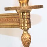 Pair of gilded bronze sconces in Directoire/Empire style