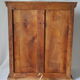 Antique walnut display cabinet from the 20th century.