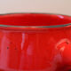 Vintage poelon in bright red glazed ceramic