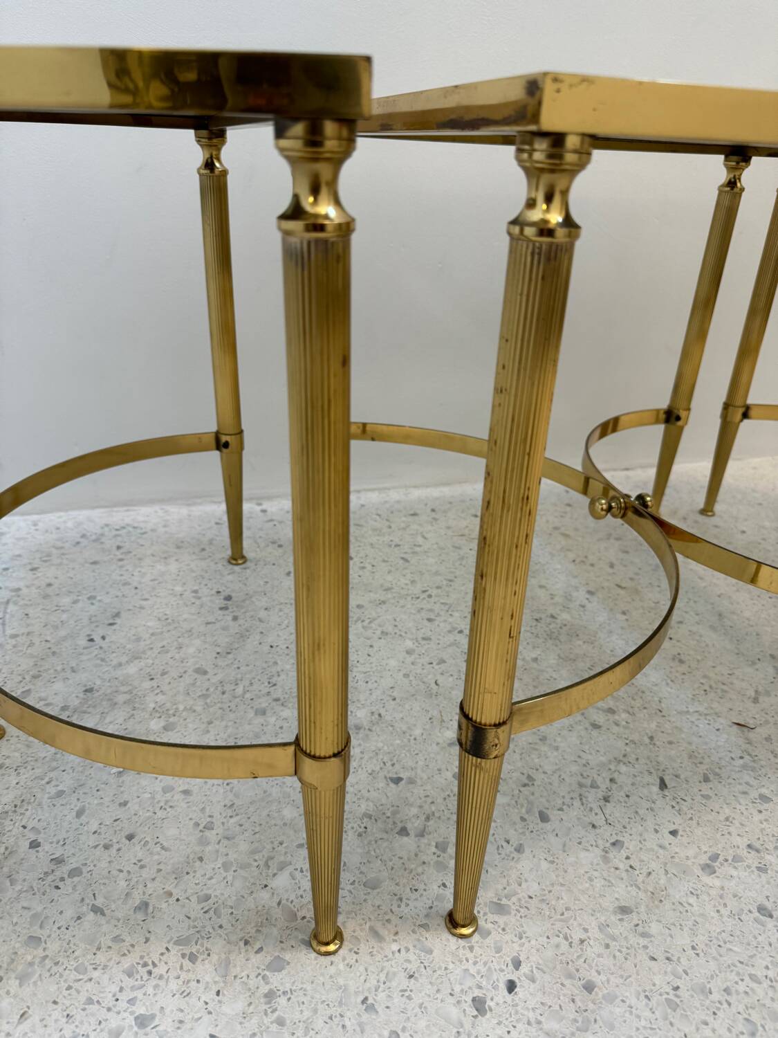 Neo classic coffee table in brass and smoked glass