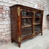 Low showcase in rosewood veneer of the regency xviii th century