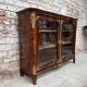 Low showcase in rosewood veneer of the regency xviii th century