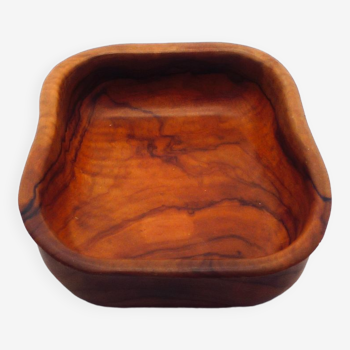 Empty pocket in olive wood