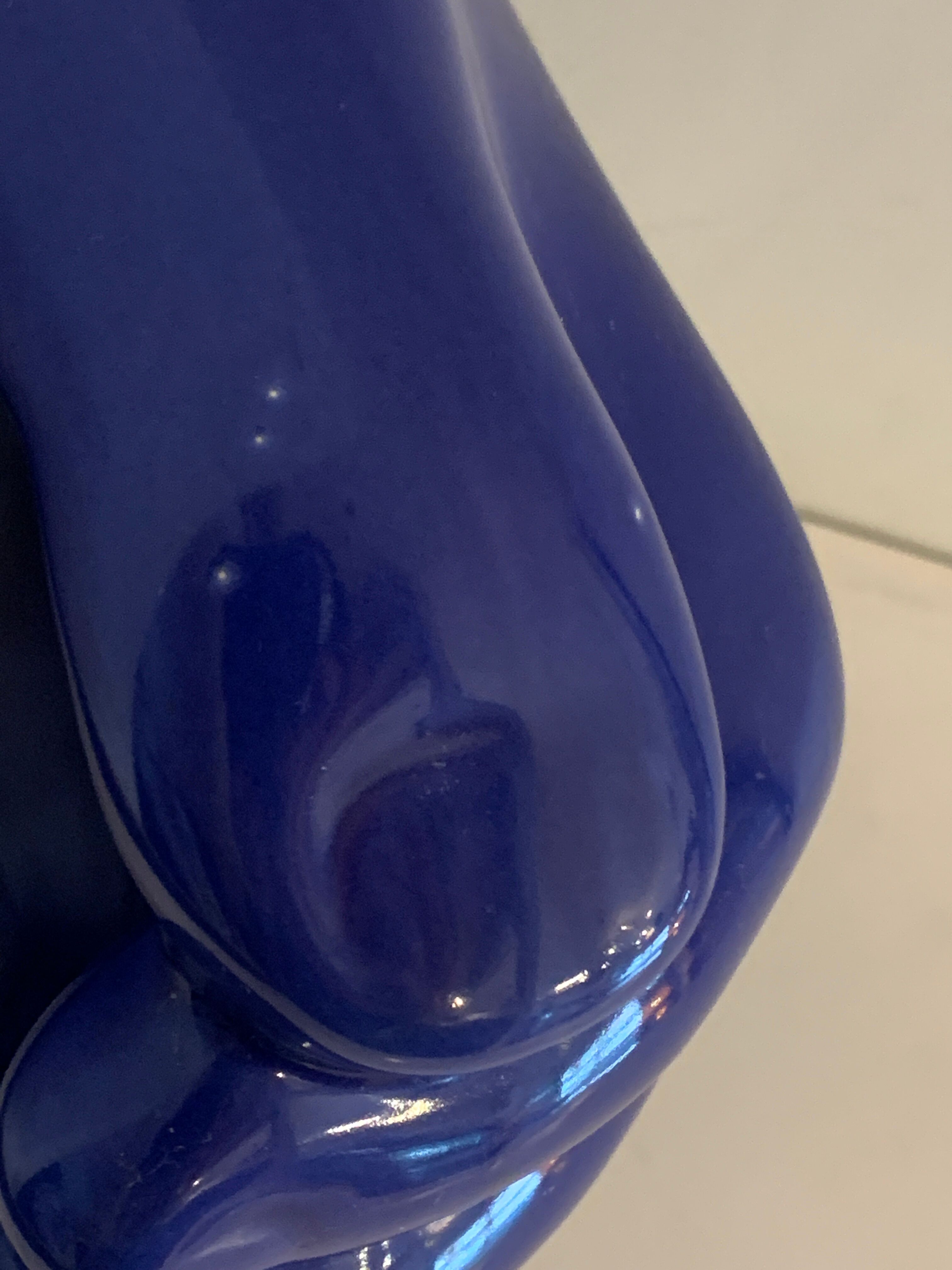 Ceramic ashtray, blue hand shape