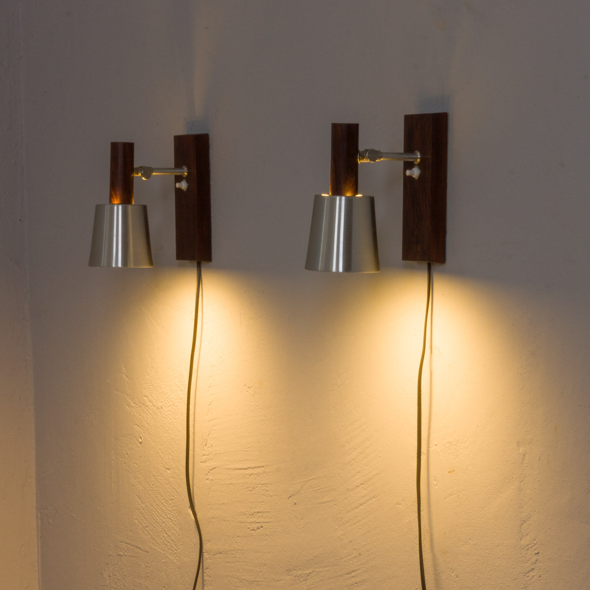 Pair of Jo Hammerborg  rosewood wall sconces with aluminium shades, Denmark 1960s