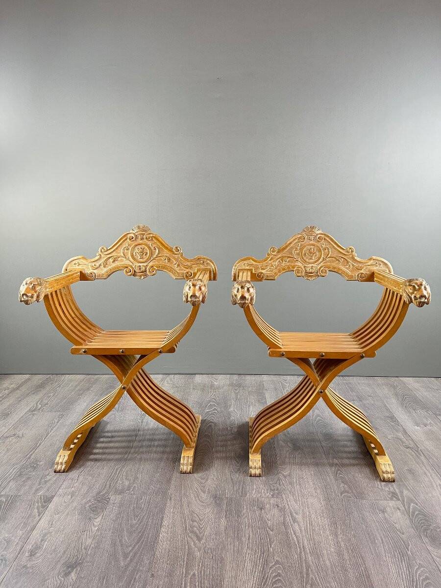 Pair of Renaissance-style folding armchairs, early 20th century