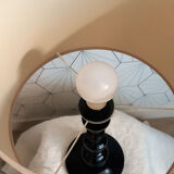 Table lamp in black lacquered turned wood.