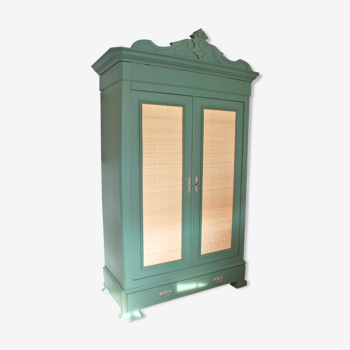 Early twentieth century cabinet revisited in green lattice and cannage