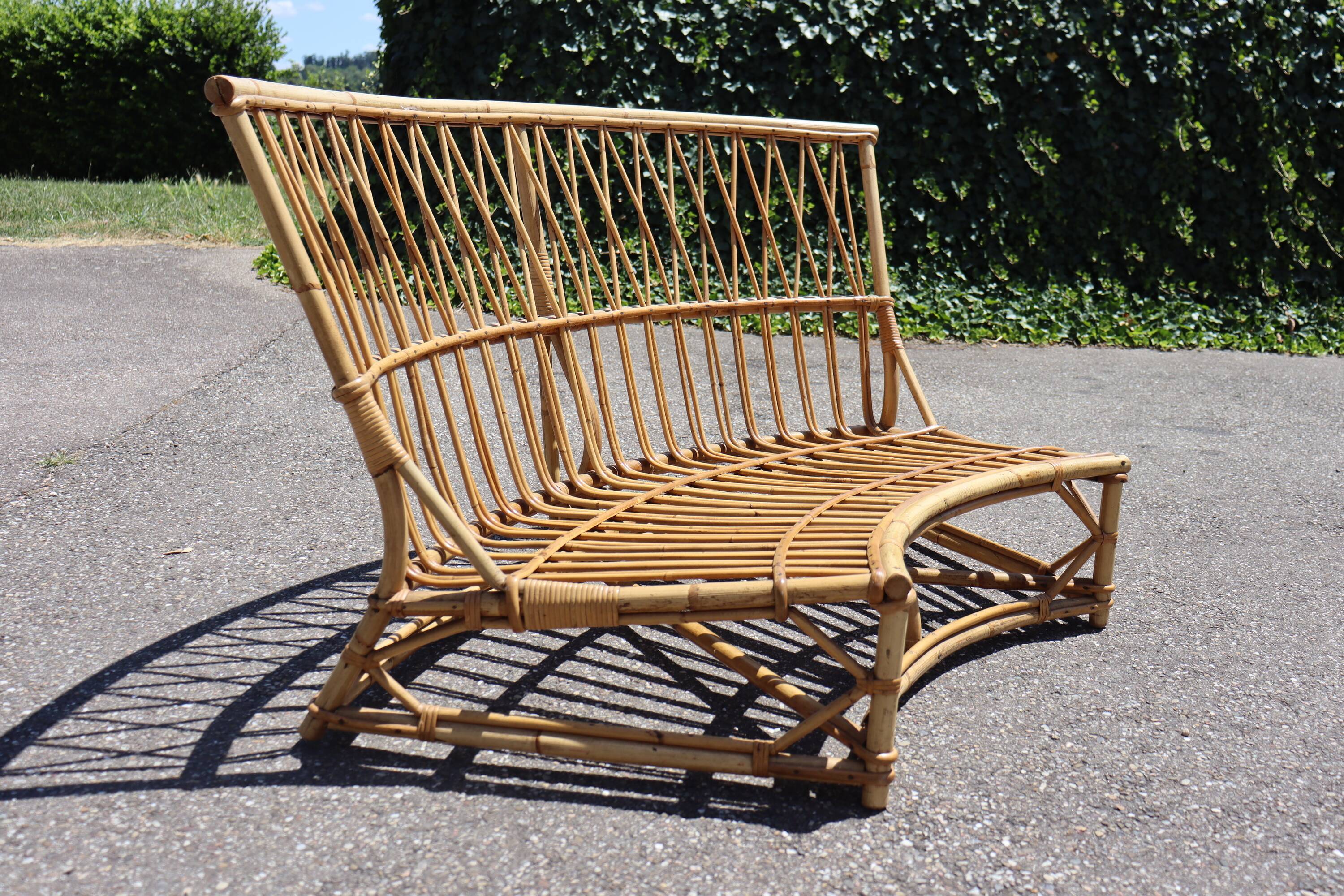 Vintage rattan sofa by Audoux Minet