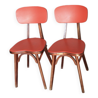 Chaises coeur Baumann en vinyle rouge et bois