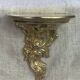Small wall console in Rococo style in bronze