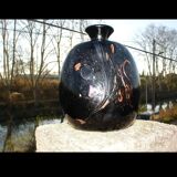 Vase in black multilayer glass paste and inclusion of gold and other colors signed by Bob Le Bleïs