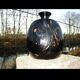 Vase in multi-layered black glass paste with inclusions of gold and other colors, signed by Bob le Bleïs