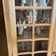 Small raw wood display cabinet