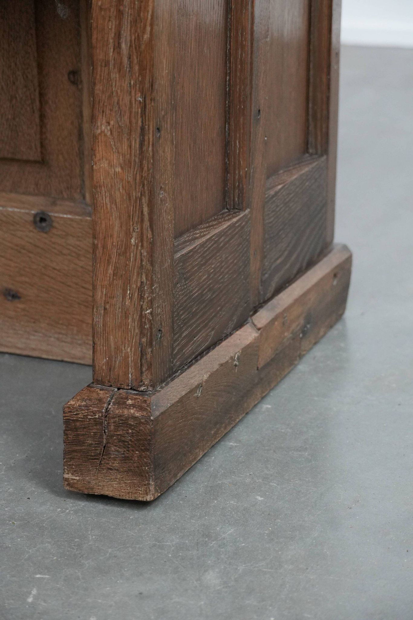 Antique oak church bench in Gothic style with beautiful wood carving