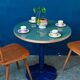 Round bistro table with tulip base in Art Deco style from the 1990s.