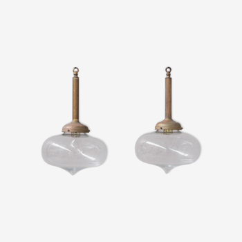 Pair of clear glass and brass mid-century teardrop pendant lights
