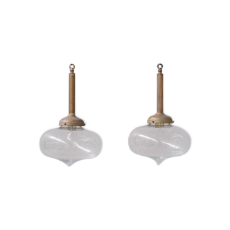 Pair of clear glass and brass mid-century teardrop pendant lights